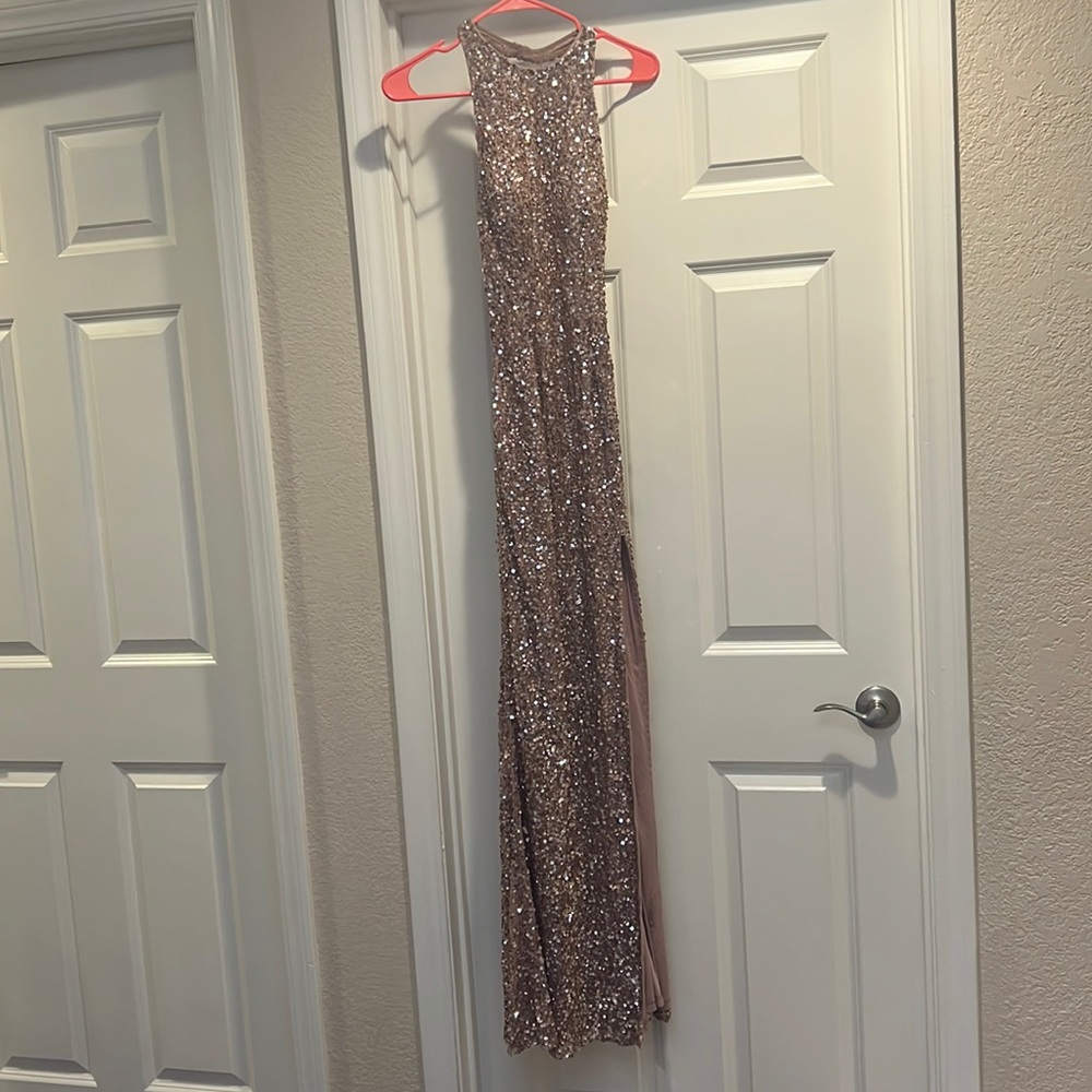 I am selling a rose gold maxi dress only worn once